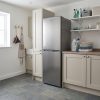 248L Freestanding Fridge Freezer 50/50 - Stainless Steel - Scale and room context