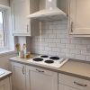 60cm Built-In Solid Plate Hob 4 Zone - White - Scale and room context