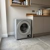 2.5kg Freestanding Tumble Dryer - Silver - Scale and room context