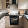 65L Built-In Electric Fan Oven & 60cm Ceramic Hob with Touch Controls - Black Glass - Scale and room context