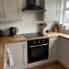 65L Built-In Electric Fan Oven & 60cm Ceramic Hob with Touch Controls - Black Glass - Product hero